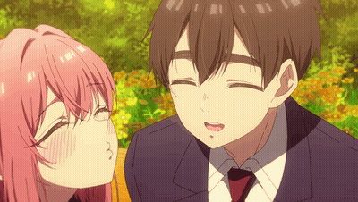 Girl With Pink Hair Kissing Boy In Suit And Tie GIF