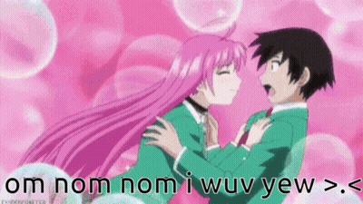 Girl With Pink Hair Kissing Boy With Black Hair GIF