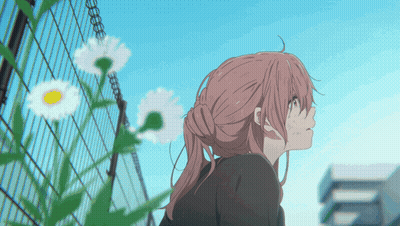 Girl With Pink Hair Standing In Front Of Fence With Daisies GIF