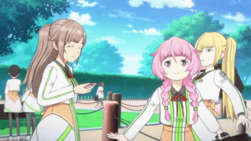 Girl With Pink Hair Standing Next To Another Girl GIF