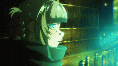 Girl With Ponytail and Blue Eyes in Front of Building