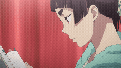 Girl With Ponytail Reading Foreign Language Book GIF