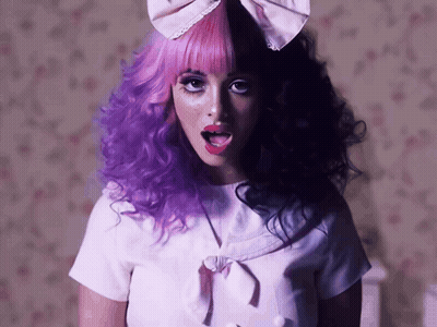 Girl With Purple And Black Hair And Bow GIF