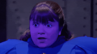 Girl With Purple Hair And Blue Coat GIF
