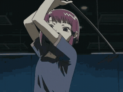Girl With Purple Hair In Blue Shirt In Dark Room GIF