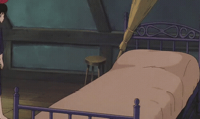 Girl With Red Bow Standing On Bed GIF