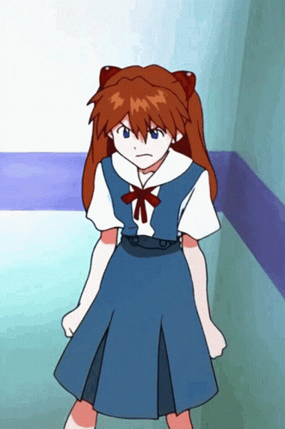 Girl With Red Hair And Blue Eyes In Blue School Uniform GIF
