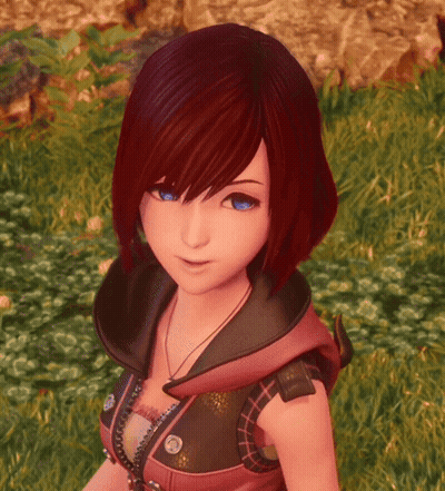 Girl With Red Hair And Blue Eyes Standing In Grass GIF