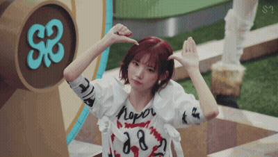 Girl With Red Hair And Never Shirt GIF