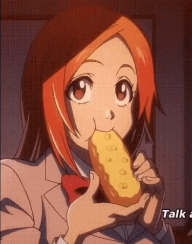 Girl With Red Hair Eating Donut Talk GIF