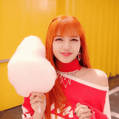 Girl With Red Hair Holding Cotton Candy GIF