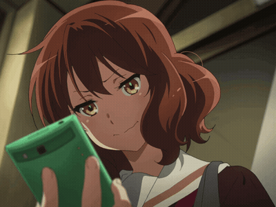Girl With Red Hair Holding Green Cell Phone GIF