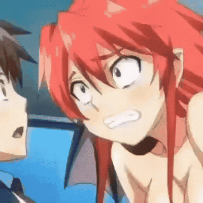 Girl With Red Hair Looking At Boy With Brown Hair GIF