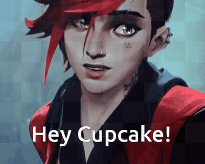 Girl With Red Hair Saying Hey Cupcake GIF
