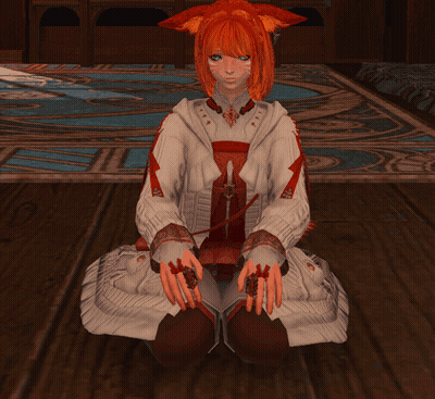 Girl With Red Hair Sitting On Floor Hands On Knees GIF