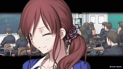 Girl With Red Hair Smiling In Classroom GIF