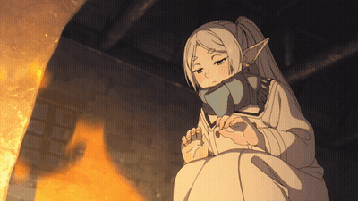 Girl With Scarf Sitting In Front Of Fireplace GIF