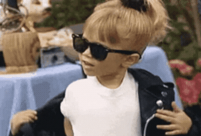 Girl With Sunglasses And Ponytail GIF