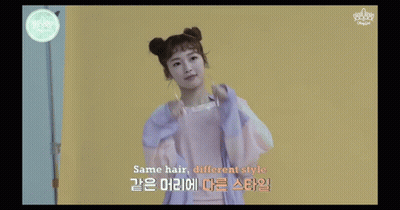 Girl With Two Buns In Purple Jacket GIF