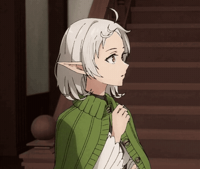 Girl With White Hair And Elf Ears In Green Cape GIF