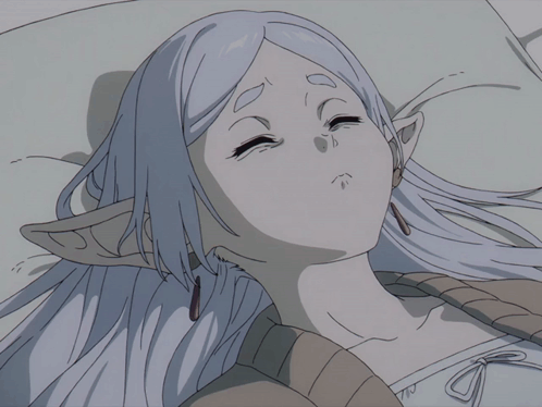 Girl With White Hair And Elf Ears Laying Down GIF