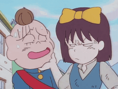Girl With Yellow Bow Standing Next To Man GIF