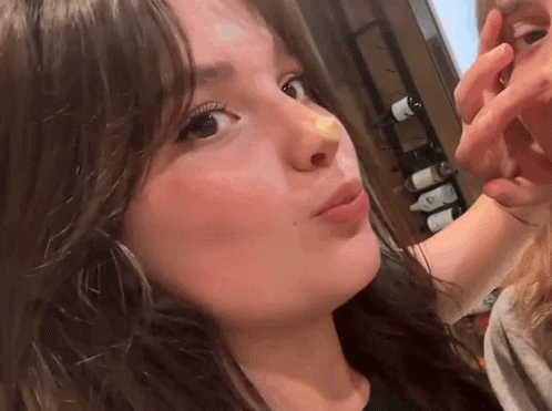 Girl With Yellow Patch On Nose GIF