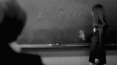 Girl Writing On Blackboard With Chalk GIF