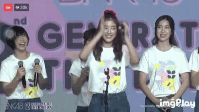 Girls At Microphones With Generation Sign GIF