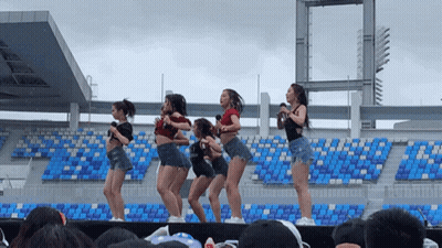 Girls Dancing On Stage In Front Of Crowd GIF