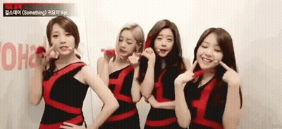 Girls Standing Together Pointing GIF