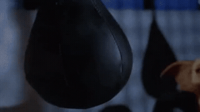 Gizmo From Gremlins Looking At Camera GIF