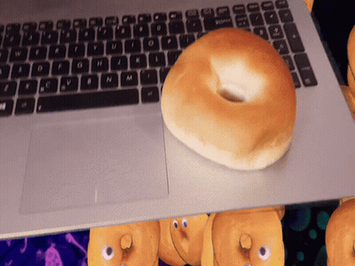 Glass Display Case Filled With Donuts Sauce GIF
