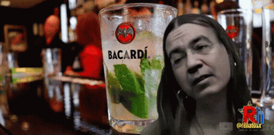 Glass of Bacardi Next to Woman's Face