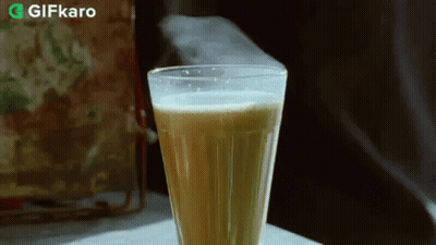 Glass Of Beer On Table With Gifkaro Logo GIF