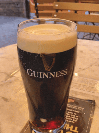 Glass Of Guinness On Marble Table GIF