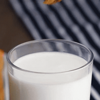 Glass Of Milk On Striped Cloth GIF