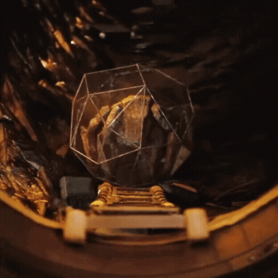 Glass Sphere On Wooden Platform GIF