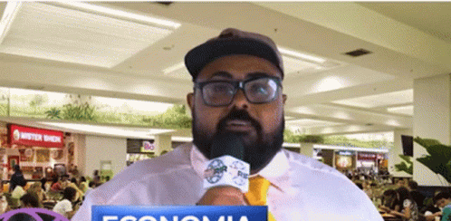 Glasses Hat Man Holding Microphone Mister Donut GIF