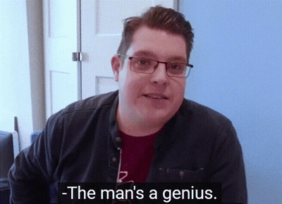 Glasses Red Shirt Man Says Man's A Genius GIF