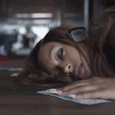 Glasses Woman Lying Floor Eyes Closed Holding Paper GIF