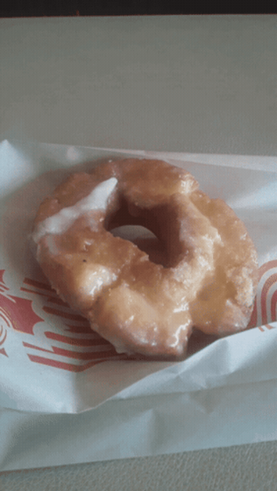 Glazed Donut Wrapped In Red And White Striped Paper GIF
