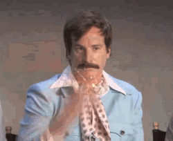 Glitter Man Donning Mustache GIF