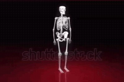 Glowing Skeleton Standing On Red Surface GIF