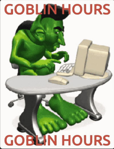 Goblin Sitting At Desk With Computer GIF