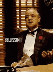 Godfather Looking Up While Holding Cat GIF