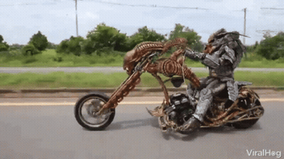 Gold And Silver Motorcycle Large Tire GIF