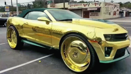 Gold Convertible Parked In Parking Lot GIF
