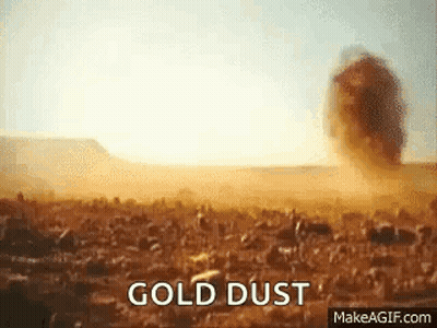 Gold Dust Explosion In Desert GIF