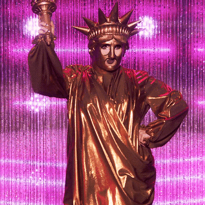Gold Statue Of Liberty Holding Torch GIF